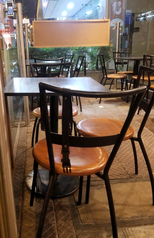  Restaurant near Larcormar seaside mall had purse hangers at each table