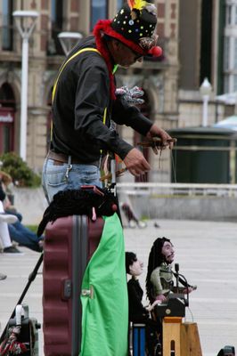As I walked along the waterfront I heard and then saw a puppeteer. 