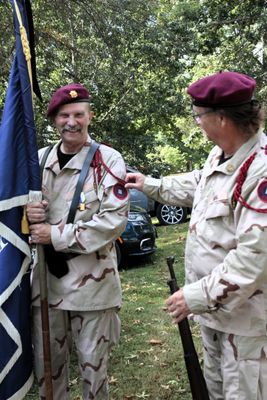 Next day: Old Stone Church Cemetery for the Founders Day Ceremony. Here Billy Sturgis spruces up Mike Kidd's uniform