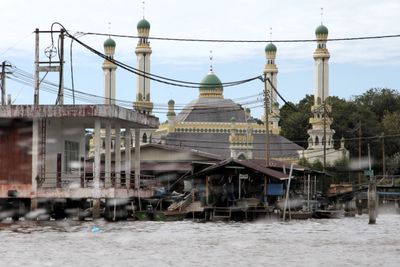 Then the boat traveled through Kampong Ayer. They have a school, several mosques, a fire station, and electricity. 