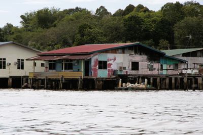  Brunei has $ but houses are modest. Some are more modest than others.