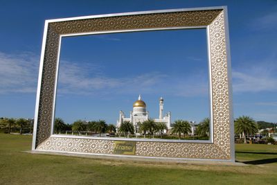 Omar Ali Saifuddien mosque through a huge Frame structure in a field