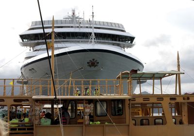  Riviera with boat in front.