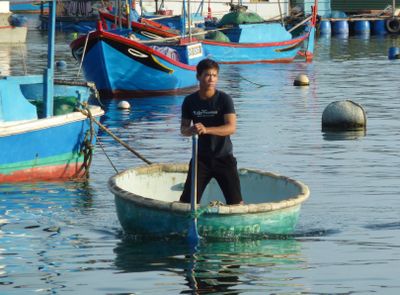Coming ashore, probably from a fishing boat