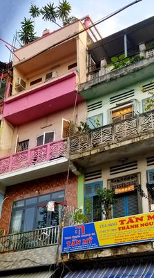  Tidy narrow, colorful houses & shops in district 1