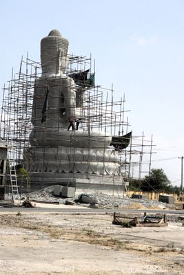 A huge Buddha is being built.