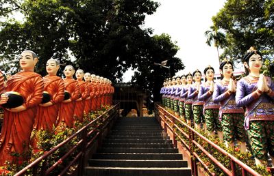 From the area of the reclining Buddha to more buildings was a long stretch of stairs with 3 rows of statues