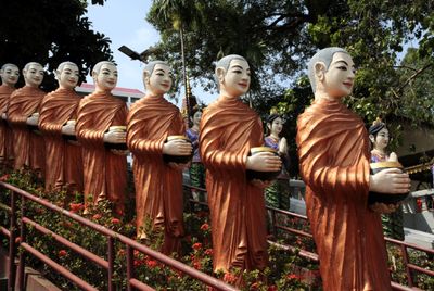  Statue of Wat Krom monks asking for alms