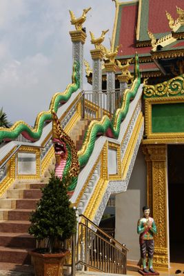  One of twin stairways Wat Krom with symbolic snakes & kannara/kinnari birds