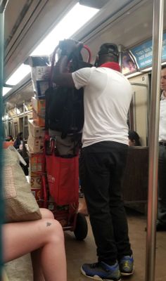 This man was selling sodas on one of the trains. He came prepared with quite a selection. 
