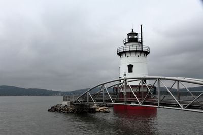 Behind the lighthouse. Too bad the little walkway was off limits.