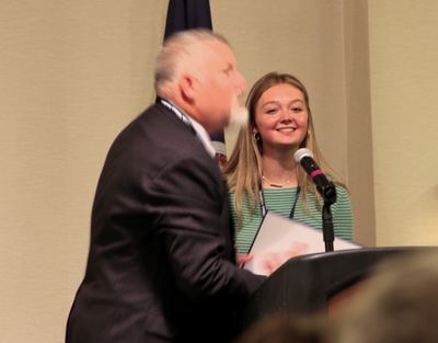Sister of Brandon accepts AMA Legacy award for him.
