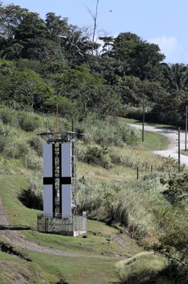 Closeup of a new & small range marker on shore