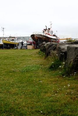 Old harbor had old boats & boats being repaired