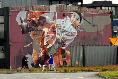 Old harbor mural with dogs & kids