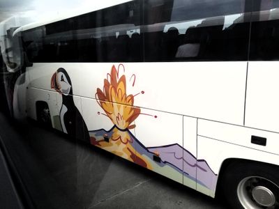 Tour buses on Heimaey show two well-known sights.  We saw sprangen, golf course, and more, ending at Museum.