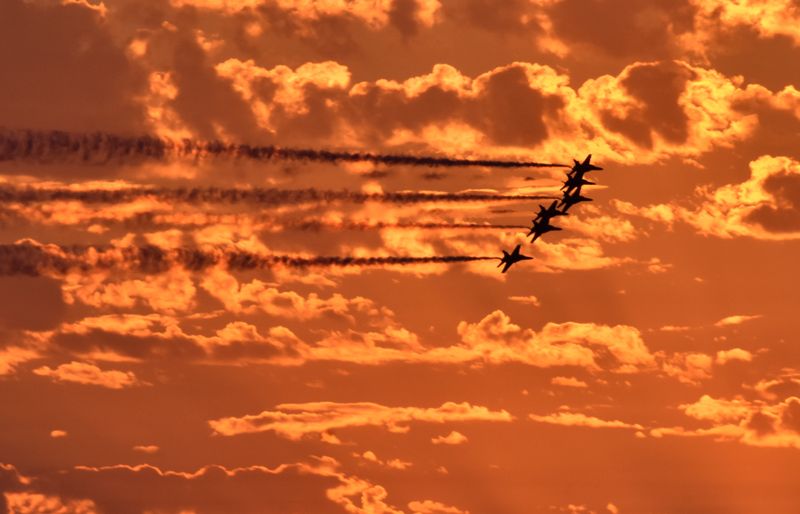 The Blue Angels returning to Pensacola from a show in Texas, just after sunset