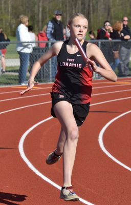 Grace running the 4x100 relay (8th grade)