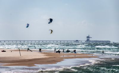 Surfers on Ashkelon marina beach, Israel
