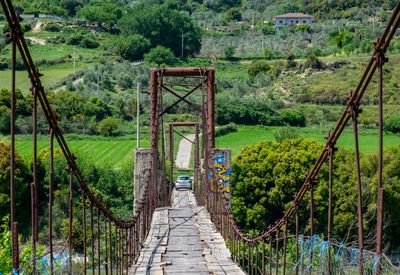 A Rusty Rustic Suspended Bridge