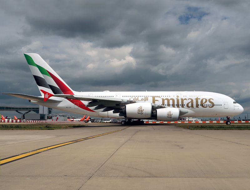Revised 2023 livery, larger titles and a new wavy flag design