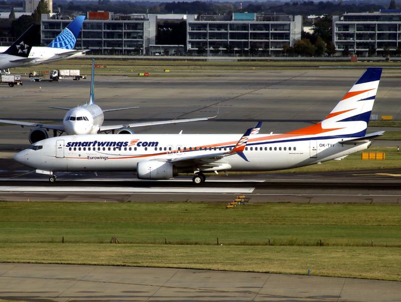 Dep for Eurowings (small titles) from 27L at Heathrow