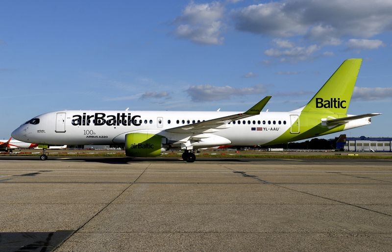 Arrival Gatwick with 100th A220 sticker
