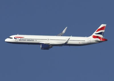 Airlines in flight banking towards the Photographer