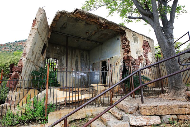0030-3B9A5132-Jeromes Wild West Jailhouse that had a slow slide down the Mountainside.jpg