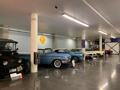 Lucky's Garage. From left, 1922 Ford Model T, 1960 Chevy, late '60s Buick, circa 1970 Oldsmobile, '66 Ford Mustang, AMX (5332)