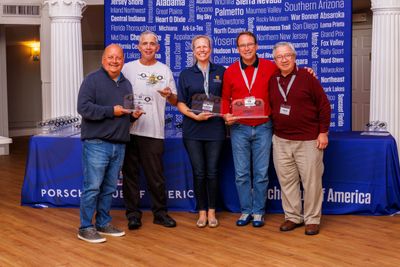 (10) Manny A. & Bob G. finished 2nd, left, while David D. & wife Atena R. won the CC53 rally. I'm at right. (photo by Jim McKee)