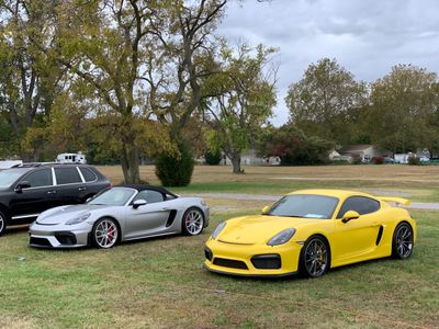 Right, 2016 Porsche Cayman GT4 (981) in Racing Yellow (4086)