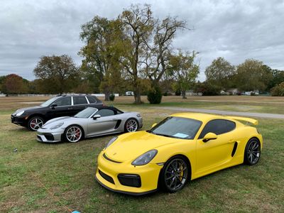 Right, 2016 Porsche Cayman GT4 (981) in Racing Yellow (4087)