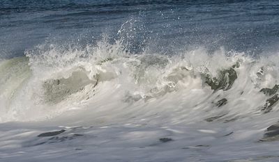 Ocean waves closer by beach.jpg