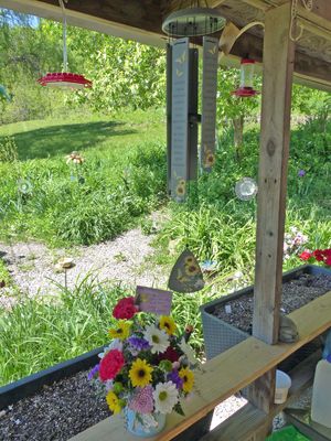 Wind chime and flowers