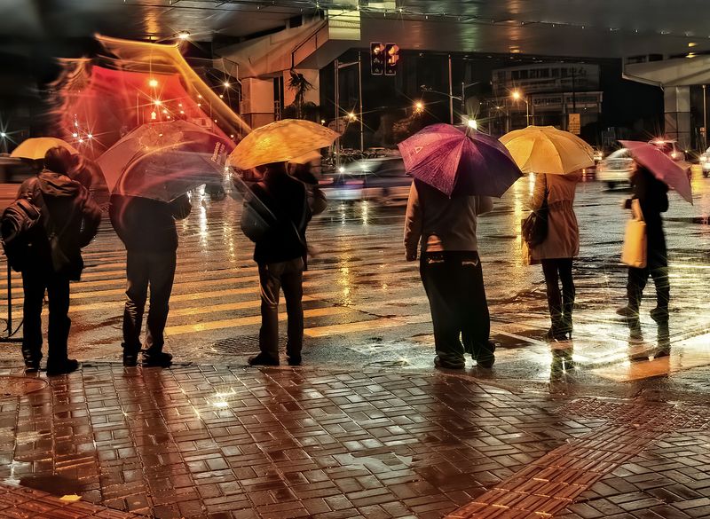 Raining  --  at the pedestrian crossing