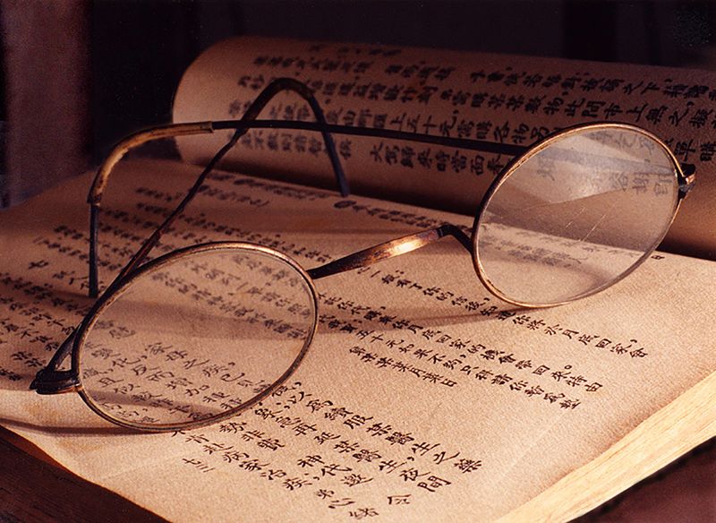 Spectacles and an Open Book