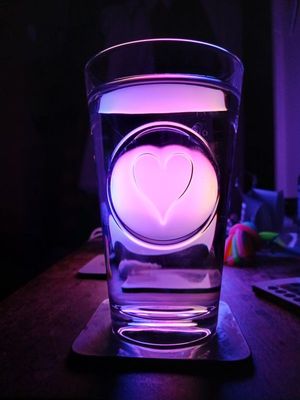 14th February 2025 - backlit glass of water with heart motif