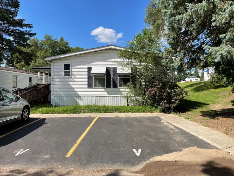 You are at the end of the street - no mobile home on right side. House on right faces the street behind the mobile home park.