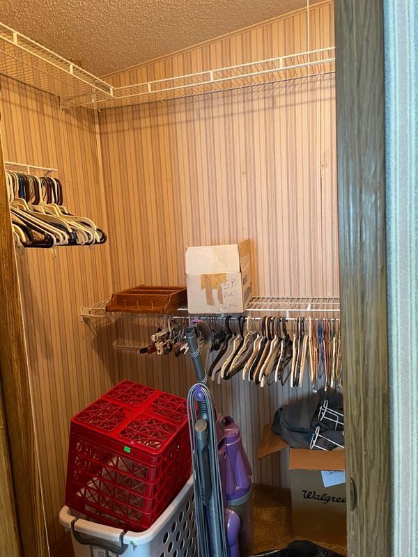 Here is the walk-in closet in primary bed/bathroom.