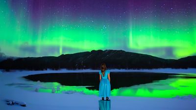 Girl Looking at Northern Lights