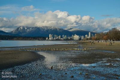 Kitsilano Beach and distant Crown Mountain...low tide, fresh snow