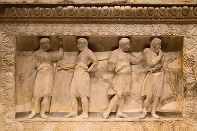 Istanbul Archaeological Museum Satrap Sarcophagus Short side Four groomes prepare for a hunt 4015.jpg