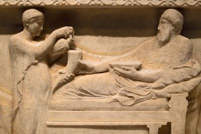 Istanbul Archaeological Museum Satrap Sarcophagus Short side Satrap banqueting with wife 2969.jpg