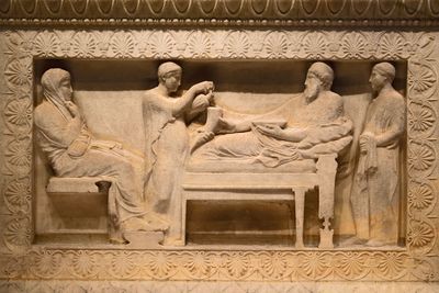 Istanbul Archaeological Museum Satrap Sarcophagus Short side Satrap banqueting with wife 4016.jpg