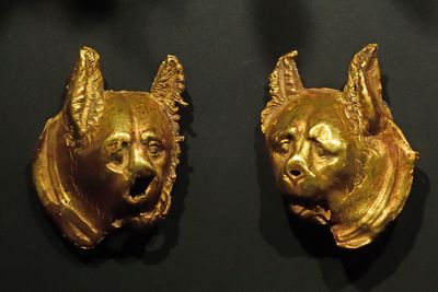 Istanbul Archaeology Museum Dog head plaques 3rd C BCE Bergama 4093.jpg