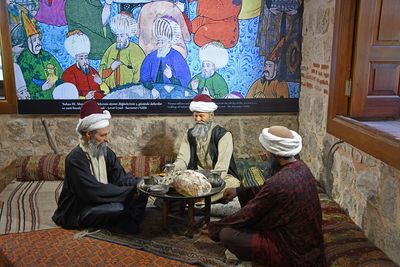 Complex of Sultan Bayezid II Imaret Museum The occupations room Guests at meal table in 2024 5692.jpg
