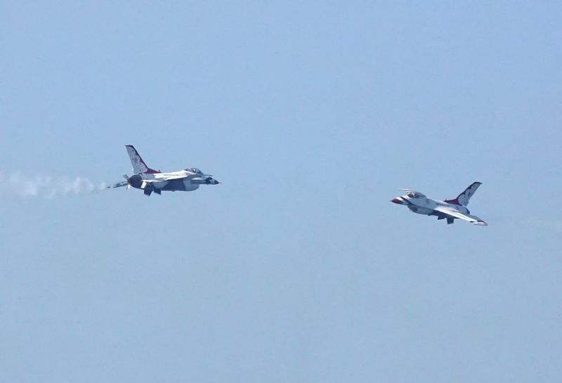 It took me about 5 years to get this sequence of 4 pictures of 2 of the Thunderbirds crossing at over 700mph