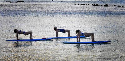 Yoga Class on Paddle Boards