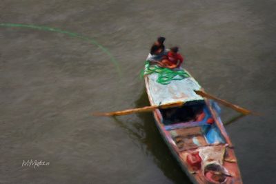 Two Boys and Rope in Water